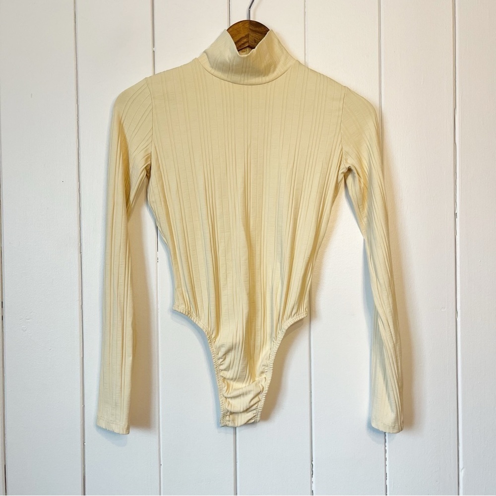 J'Suis Snob Cream Ribbed Long Sleeve Bodysuit. Size Medium.
